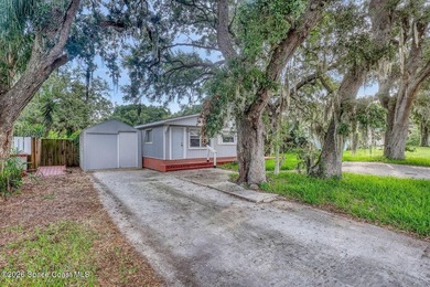 PRICED TO SELL! Cottage charm meets coastal opportunity! Tucked - photo 7