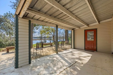 Welcome home to easy lakeside living! Steel construction with - photo 27
