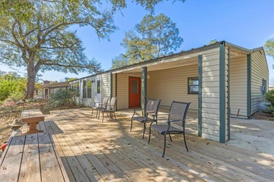 Welcome home to easy lakeside living! Steel construction with - photo 28
