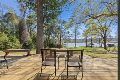 Welcome home to easy lakeside living! Steel construction with - photo 30
