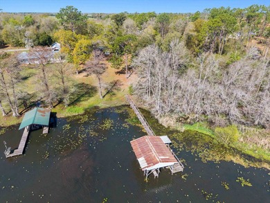 Welcome home to easy lakeside living! Steel construction with - photo 32