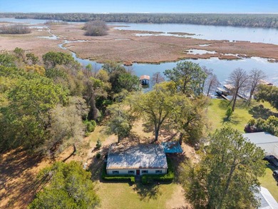 Welcome home to easy lakeside living! Steel construction with - photo 33