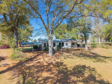 Welcome home to easy lakeside living! Steel construction with - photo 37