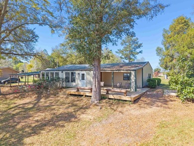 Welcome home to easy lakeside living! Steel construction with - photo 38