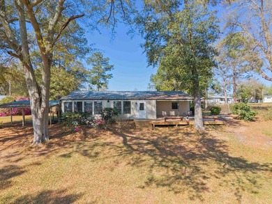 Welcome home to easy lakeside living! Steel construction with - photo 39