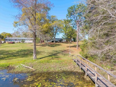 Welcome home to easy lakeside living! Steel construction with - photo 40