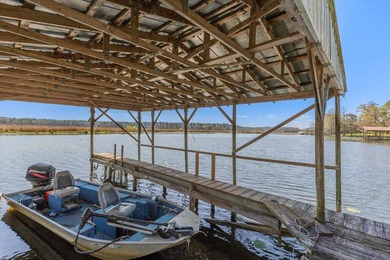 Welcome home to easy lakeside living! Steel construction with - photo 42