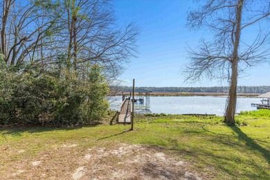 Welcome home to easy lakeside living! Steel construction with - photo 46
