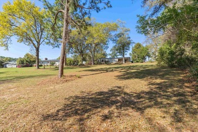 Welcome home to easy lakeside living! Steel construction with - photo 47