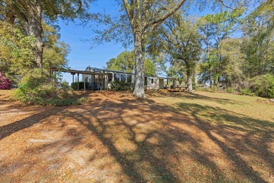 Welcome home to easy lakeside living! Steel construction with - photo 49