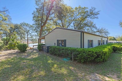 Welcome home to easy lakeside living! Steel construction with - photo 50