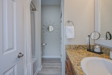 Nestled in the waterfront community of Holiday Beach, this - photo 20