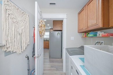 Nestled in the waterfront community of Holiday Beach, this - photo 23
