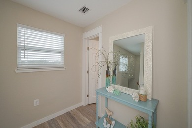 Nestled in the waterfront community of Holiday Beach, this - photo 26