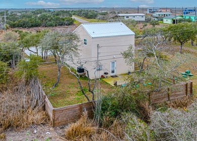 Nestled in the waterfront community of Holiday Beach, this - photo 36