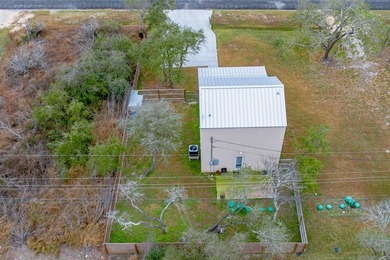 Nestled in the waterfront community of Holiday Beach, this - photo 37