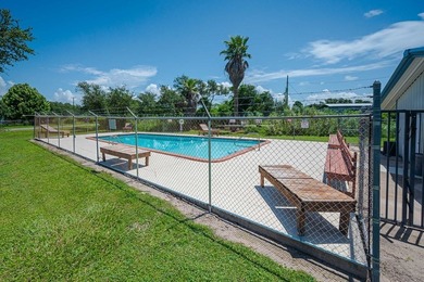 Nestled in the waterfront community of Holiday Beach, this - photo 38