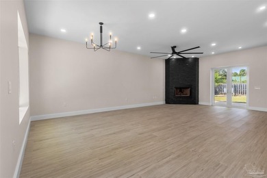 Experience modern Gulf Coast living at 5468 Cimmeron Ct in Gulf - photo 3