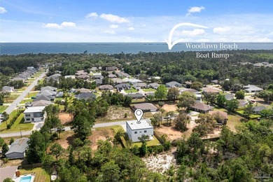 Experience modern Gulf Coast living at 5468 Cimmeron Ct in Gulf - photo 8