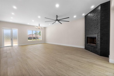 Experience modern Gulf Coast living at 5468 Cimmeron Ct in Gulf - photo 9