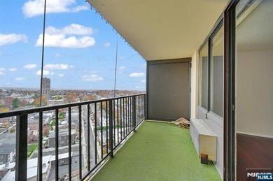 *LUXURY 16TH-FLOOR CONDO* Perched high on the 16th floor of one
