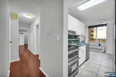 *LUXURY 16TH-FLOOR CONDO* Perched high on the 16th floor of one