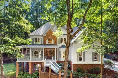 Beautifully remodeled four-sided brick & shingle home with three - photo 2