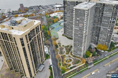 *LUXURY 16TH-FLOOR CONDO* Perched high on the 16th floor of one