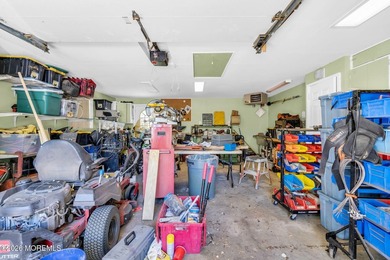Nestled on 1.59 acres of beautifully landscaped property, this - photo 32