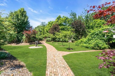 Nestled on 1.59 acres of beautifully landscaped property, this - photo 34