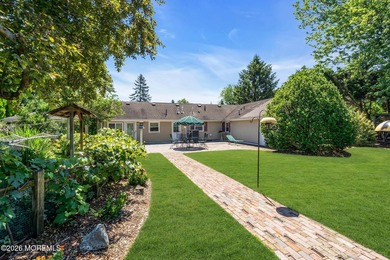 Nestled on 1.59 acres of beautifully landscaped property, this - photo 35