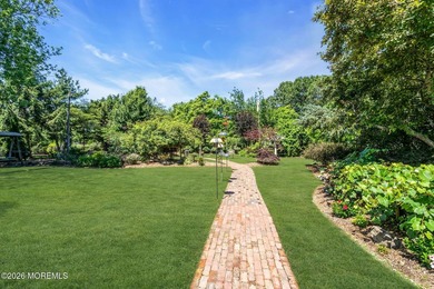 Nestled on 1.59 acres of beautifully landscaped property, this - photo 36