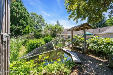 Nestled on 1.59 acres of beautifully landscaped property, this - photo 37
