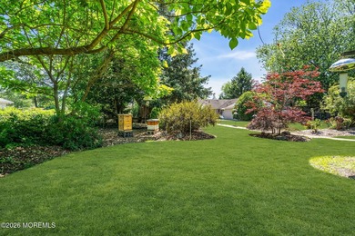 Nestled on 1.59 acres of beautifully landscaped property, this - photo 38