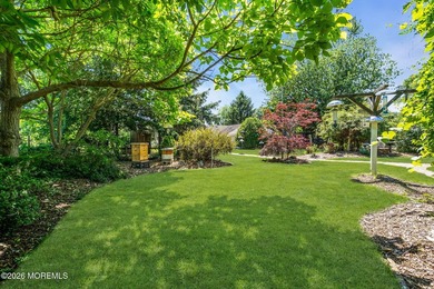 Nestled on 1.59 acres of beautifully landscaped property, this - photo 39