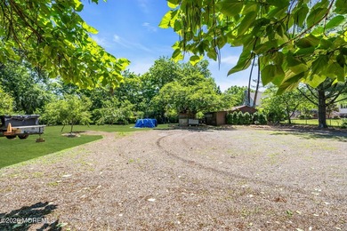 Nestled on 1.59 acres of beautifully landscaped property, this - photo 44