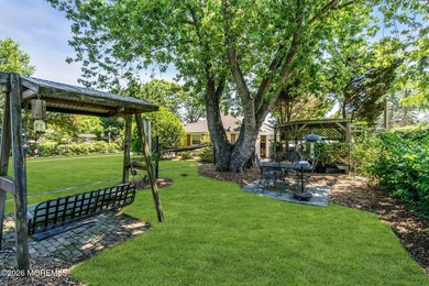 Nestled on 1.59 acres of beautifully landscaped property, this - photo 46
