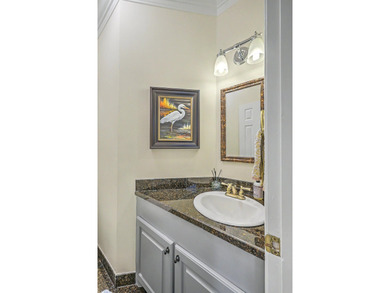 Nestled within the prestigious gated golf course community of - photo 13