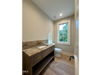 2025 Parade of Homes Entry- Located in the coveted Country Club