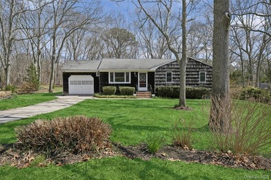 This lovely Hampton Bays residence sits on .47 acres and offers - photo 1