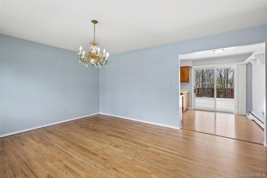 This lovely Hampton Bays residence sits on .47 acres and offers - photo 2