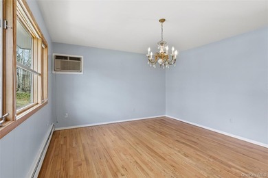 This lovely Hampton Bays residence sits on .47 acres and offers - photo 4