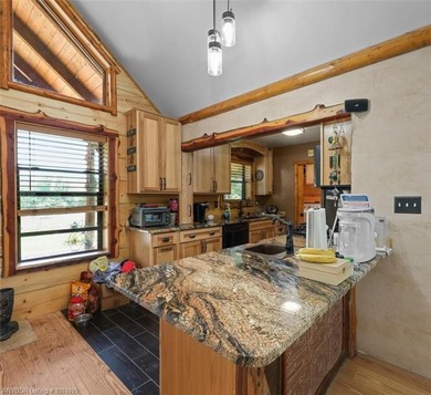 Nestled in the scenic Kiamichi River Valley, with direct access - photo 10