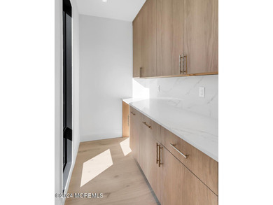 Experience unobstructed panoramic water views of the Manhattan - photo 11