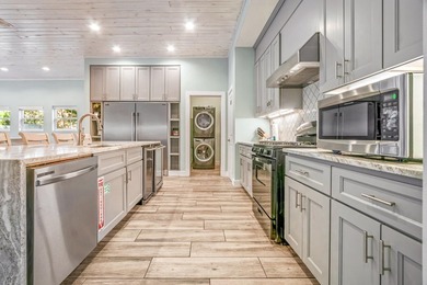 Discover this coastal luxury and pristine 2019-built, 7-bedroom - photo 13