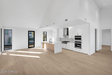 Experience unobstructed panoramic water views of the Manhattan - photo 13
