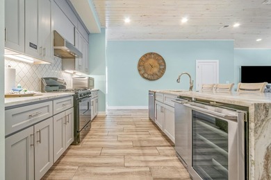 Discover this coastal luxury and pristine 2019-built, 7-bedroom - photo 14