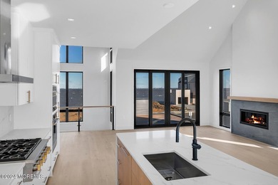 Experience unobstructed panoramic water views of the Manhattan - photo 14