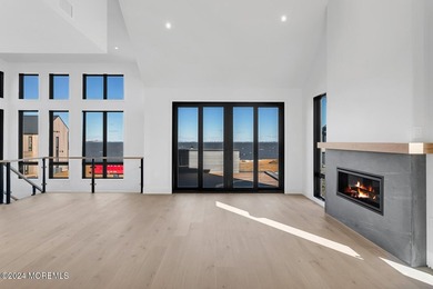 Experience unobstructed panoramic water views of the Manhattan - photo 15