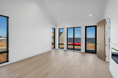 Experience unobstructed panoramic water views of the Manhattan - photo 18